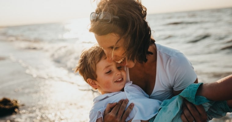 mom and child at beach
