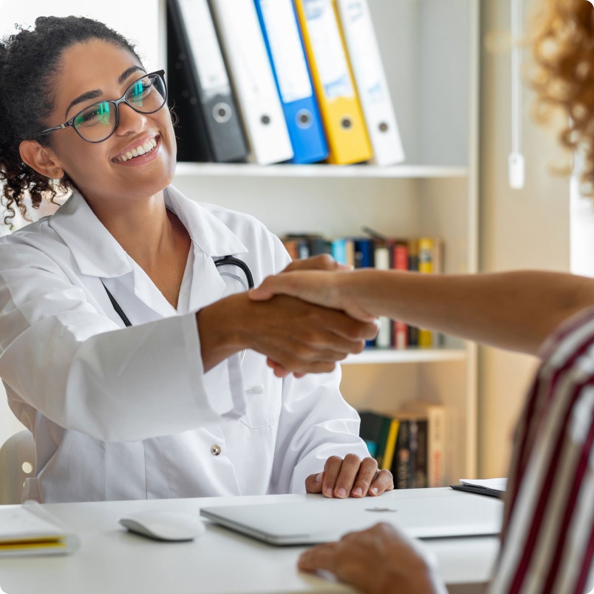 doctor and patient shaking hands